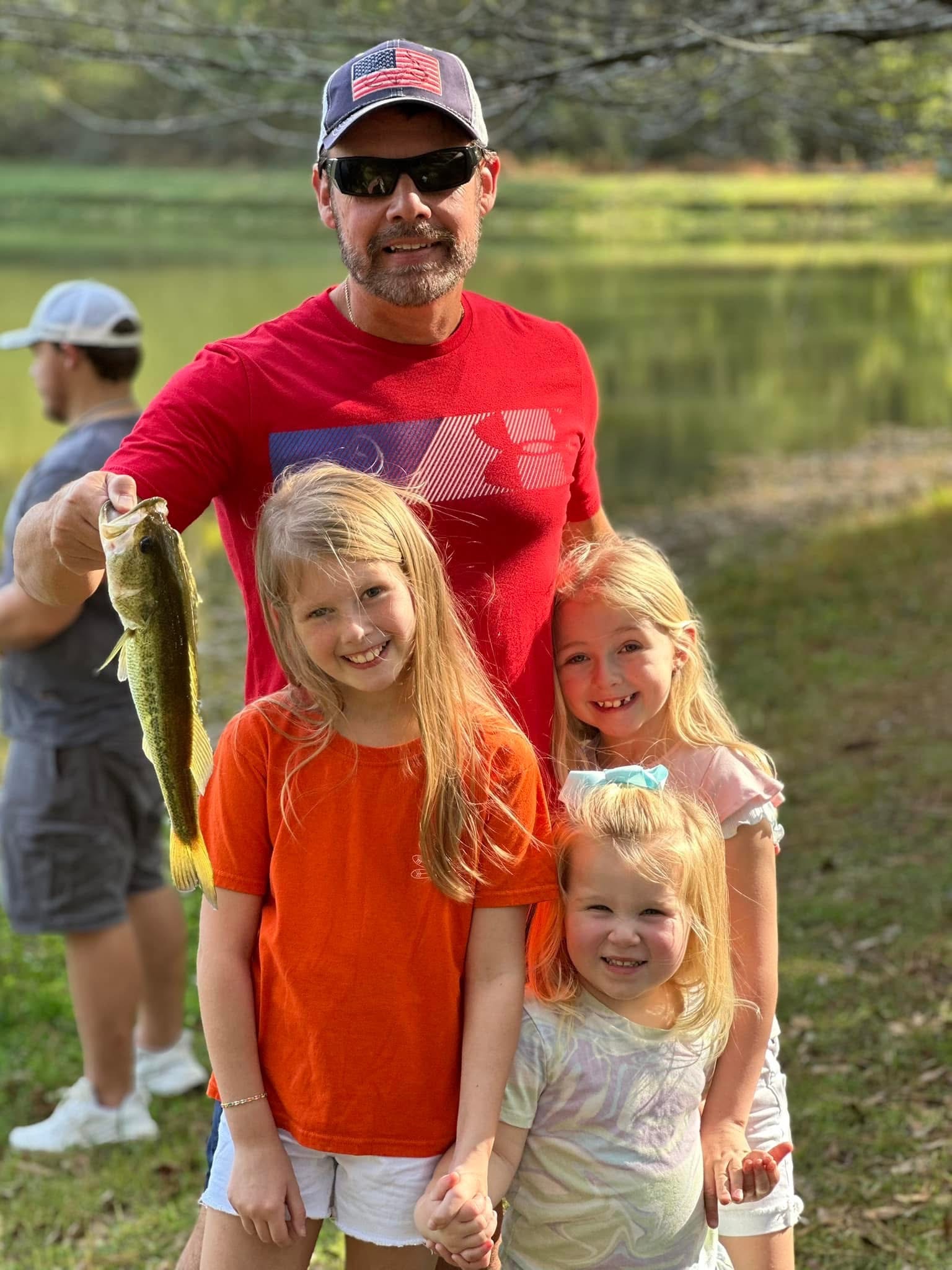Shawn Chatham sharing a fishing memory with family