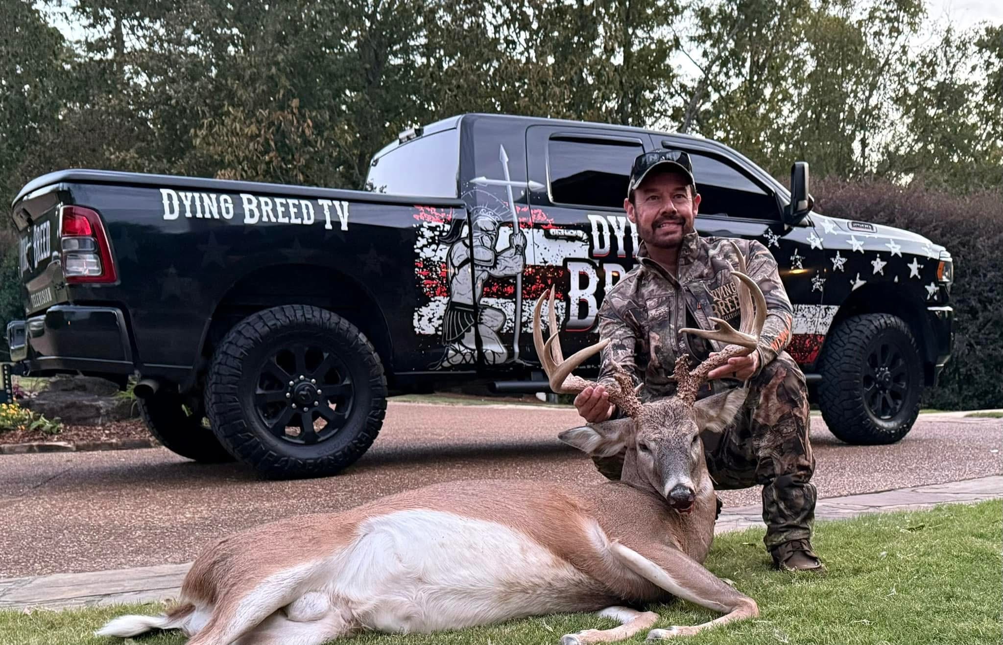 Shawn Chatham with a mature whitetail and the Dying Breed Television truck